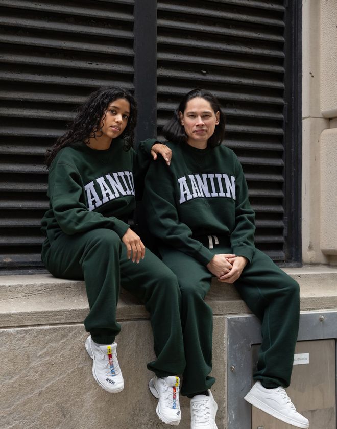 Two models wearing Aaniin branded sweatsuits, a Benjamin's Agency client